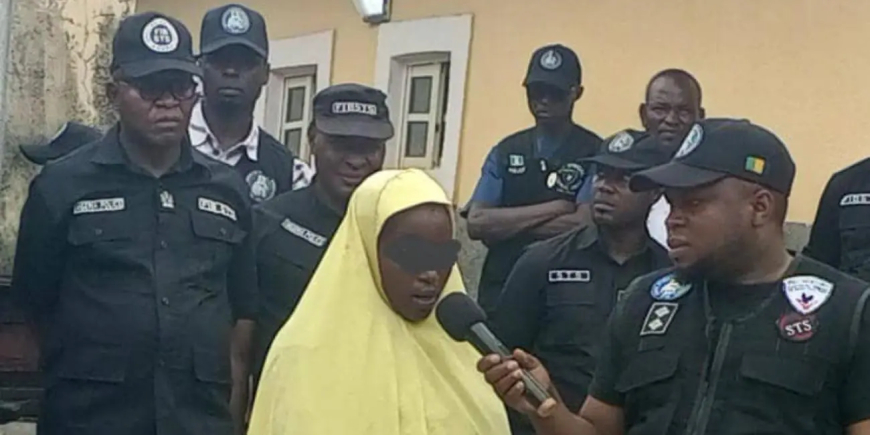 Police Arrest Lady With AK-47, Magazines Hidden Inside Garri