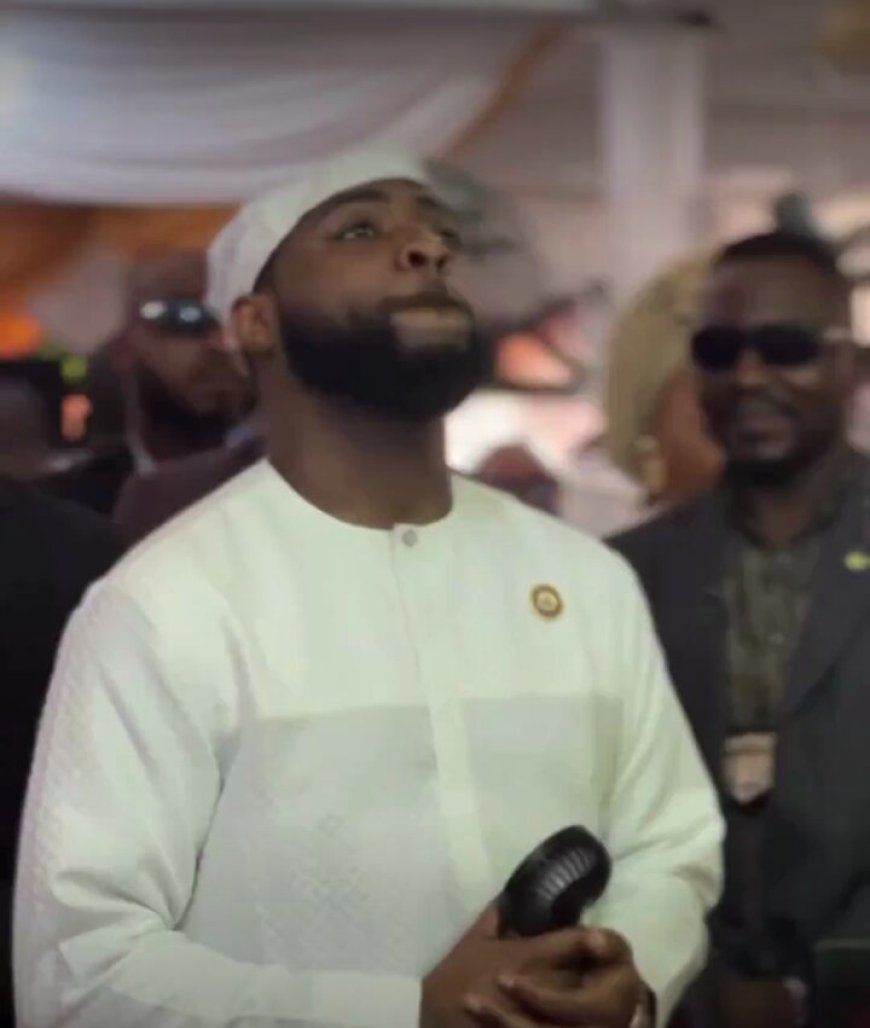 It's Not Biblical Putting On Cap During  Church Program; Fan Warns Davido