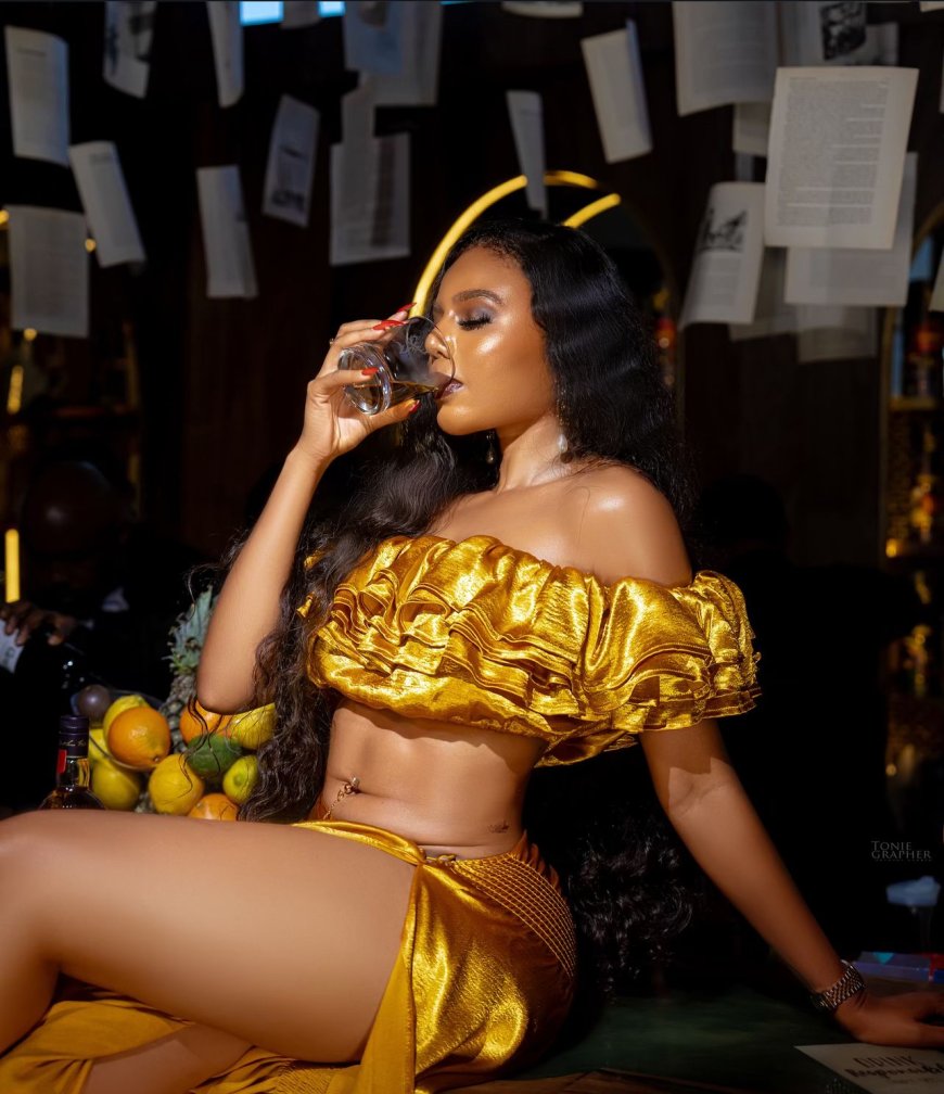 Nancy Isime Stuns Fans with Bold Gold Ensemble in Glenfiddich Campaign