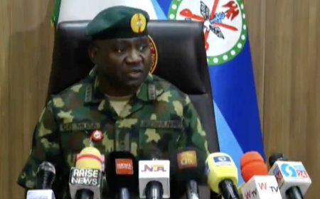 General Christopher Musa addressing the media